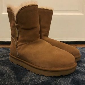 Women’s UGG boots with gold zipper